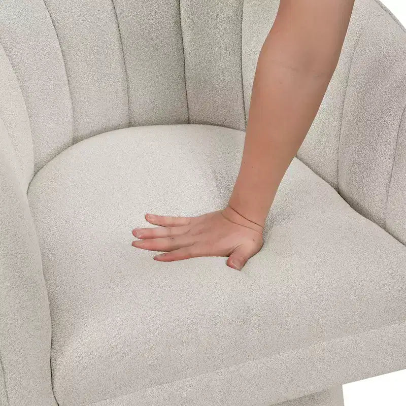 Poltrona girevole moderna GDFStudio Madison in boucle con schienale a botte